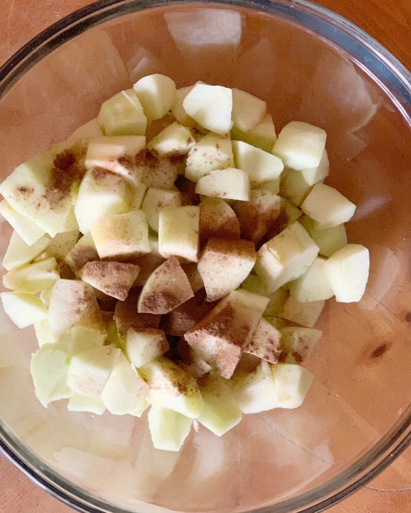 Chopped apples and cinnamon for homemade applesauce dog recipe