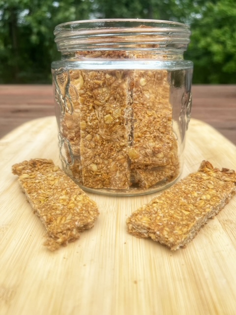 apple and oatmeal dog treat bar in glass container
